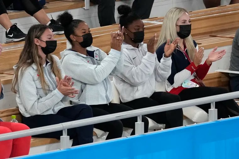 From left, United States' gymnast Grace McCallum, Jordan Chiles, Simone Biles and MyKayla Skinner celebrate after Sunisa Lee's gold medal victory in the artistic gymnastics women's all-around final at the Tokyo Olympics.