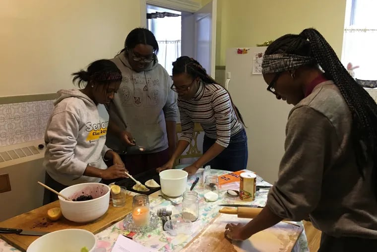 Hope Wescott, Chamya Davis, Mariah Bey and Maliyah Gregg, the first graduates of My Daughter's Kitchen cooking program, return to the convent kitchen of St. Martin De Porres for a reunion and cooking season.