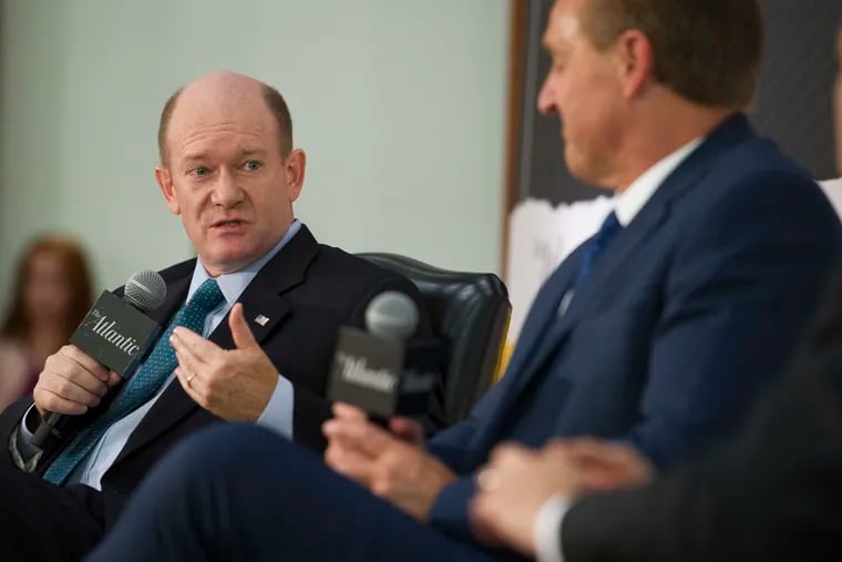 Sen. Chris Coons (left), a Delaware Democrat, speaks alongside Sen. Jeff Flake (R., Ariz.) during an interview at the The Atlantic's 'The Constitution in Crisis' forum in Washington on Oct. 2, 2018. Coons has become a voice for civility in Congress, and has often cooperated with Flake.