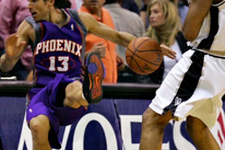 San Antonio&#0039;s Robert Horry sends Phoenix&#0039;s Steve Nash flying on a foul during Monday night&#0039;s game. Horry was ejected.