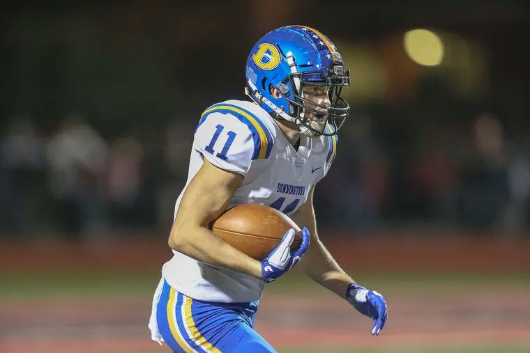 Downingtown West's Dan Byrnes returns a kickoff against Coatesville during the 1st quarter in Coatesville, Pa., Friday October 5, 2018.