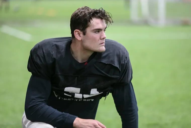 Archbishop Wood senior lineman Charley Mininger battled back from a serious knee injury to play his final season for the Vikings.