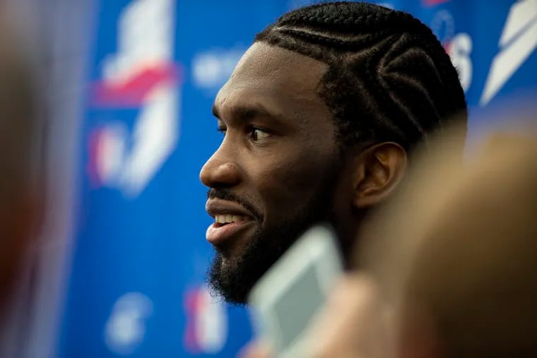 Sixers' center Joel Embiid donned a new hairstyle to open training camp.
