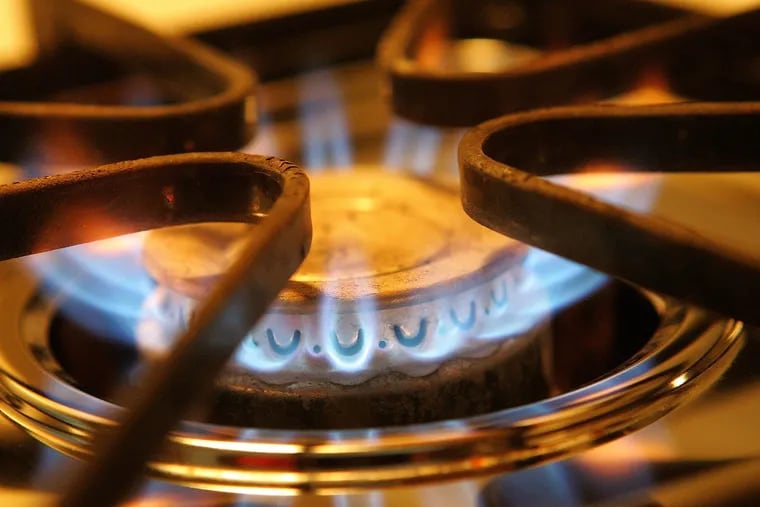 A gas burner on a stove.