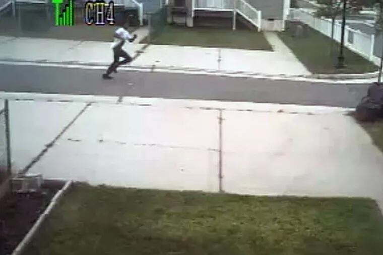 Surveillance video released by the Atlantic County prosecutor showed Shawn Brown carrying a gun during the incident.