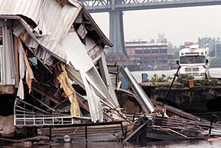 The scene on May 19, 2000, the day after Pier 34's collapse into the Delaware.