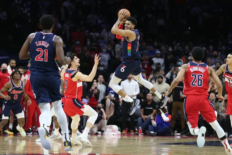 Down by two points in the final minute of play, Tobias Harris of the Sixers  leaves his feet and making a throw that started a scramble for the ball against the Wizards at the Wells Fargo Center on Feb. 2, 2022.