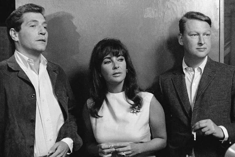 Elizabeth Taylor is flanked by Mike Nichols (right) and &quot;Who's Afraid of Virginia Woolf?&quot; costar George Segal.