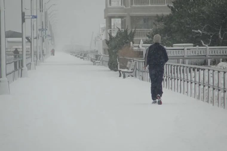 A jogger runs through the snow in Ventor, NJ., in this file photo.