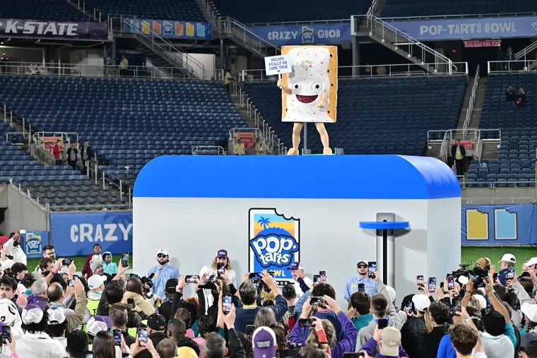 The Pop-Tart mascot looks on following the 2023 Pop-Tarts Bowl at Camping World Stadium between the Kansas State Wildcats and the NC State Wolfpack.