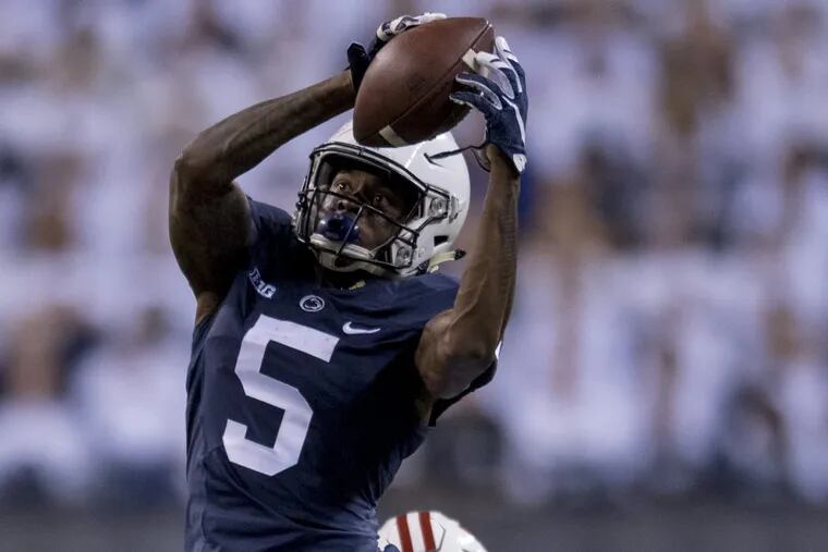Penn State’s DaeSean Hamilton pulls in a pass during a clutch performance in the Big Ten title game against Wisconsin.