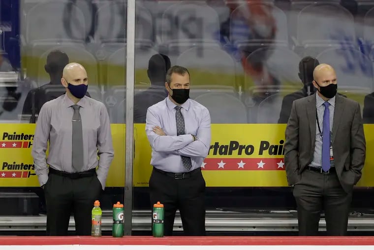 Coaches (from left) Ian Laperriere, Alain Vigneault, Mike Yeo and Michel Therrien can only watch film these days as a coronavirus outbreak has put the Flyers in quarantine at least until Monday.