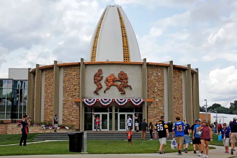 Fans gather on the lawn outside the Pro Football Hall of Fame in Canton, Ohio in 2017.