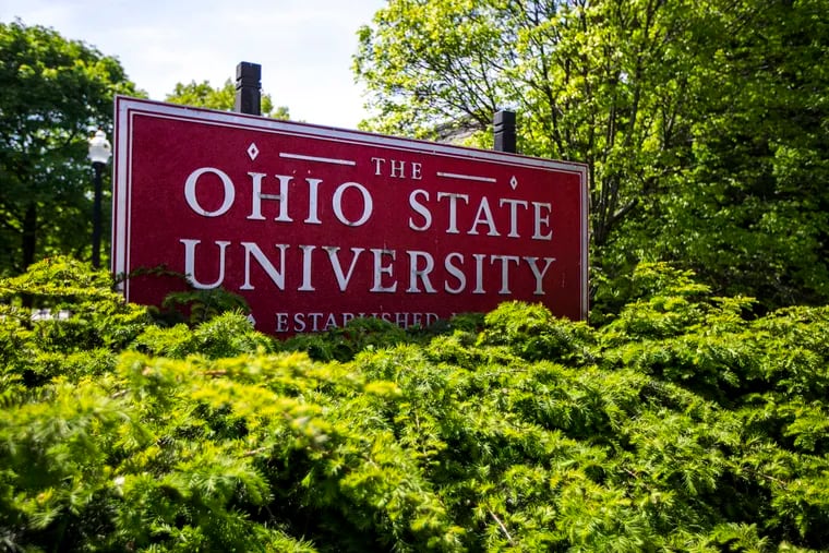 This May 8, 2019 photo shows a sign for Ohio State University in Columbus, Ohio. On Friday, May 17, 2019, the school said at least 177 men were sexually abused by Ohio State team doctor Richard Strauss who died years ago, according to findings from a law firm that investigated the accusations, concluding that school leaders knew at the time.