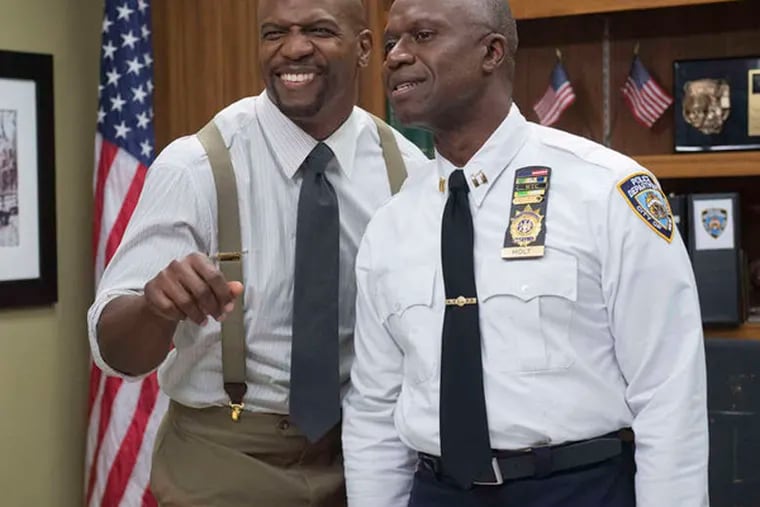Terry Crews (left), with Andre Braugher, never made it to the Super Bowl as a player. He'll be there, and after, this Sunday.
