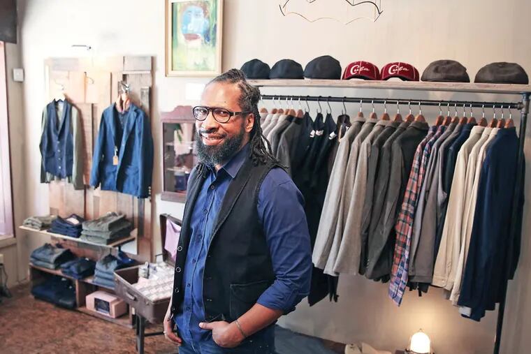 David Grimes, owner of Armour, poses inside his shop in Philadelphia on September 23, 2014. The menswear boutique is located at 704 S. 4th Street. ( DAVID MAIALETTI / Staff Photographer )