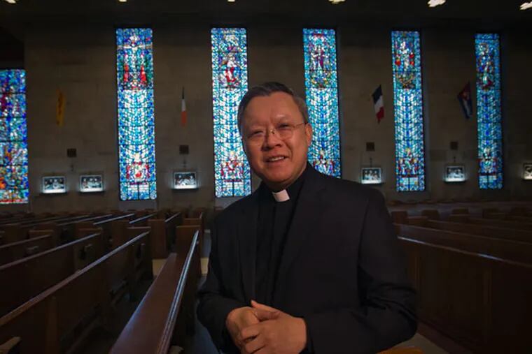 Monsignor Joseph Trinh of St. Helena Parish: “I used to get into trouble a lot and every time I was in trouble, the priest would come to visit my family...” (ALEJANDRO A. ALVAREZ / STAFF PHOTOGRAPHER).