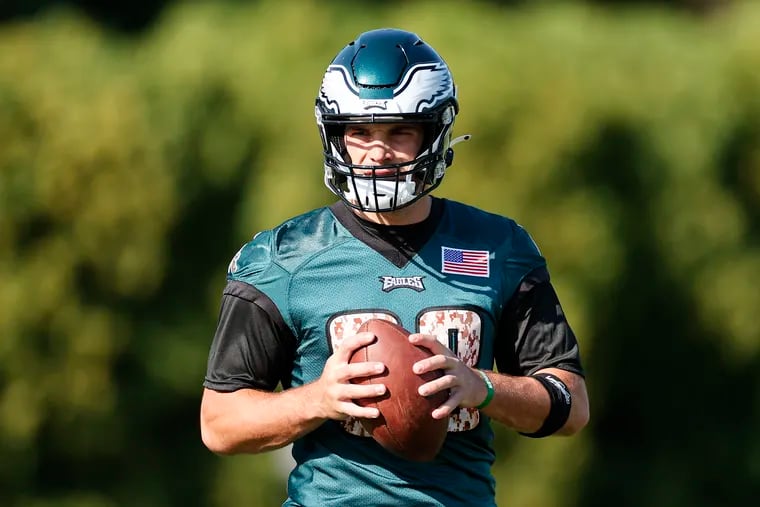 Eagles tight end Dallas Goedert holds the football during training camp at the NovaCare Complex on Saturday, July 31, 2021.