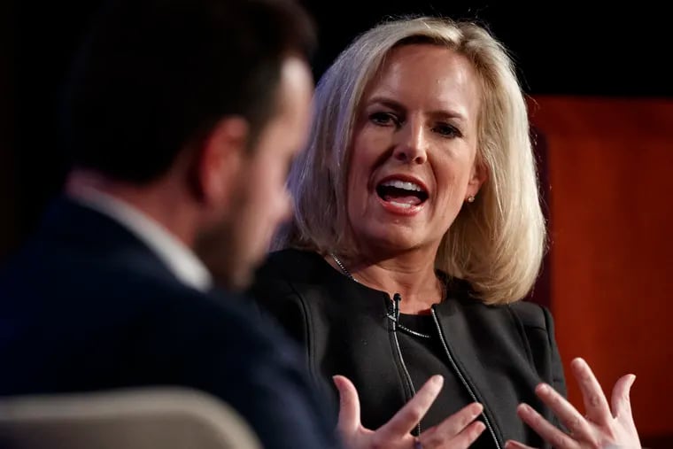 Homeland Security Secretary Kirstjen Nielsen, joined by director of Auburn University's McCrary Institute for Cyber and Critical Infrastructure Security, Frank Cilluffo, speaks at George Washington University's Jack Morton Auditorium in Washington, Monday, March 18, 2019.