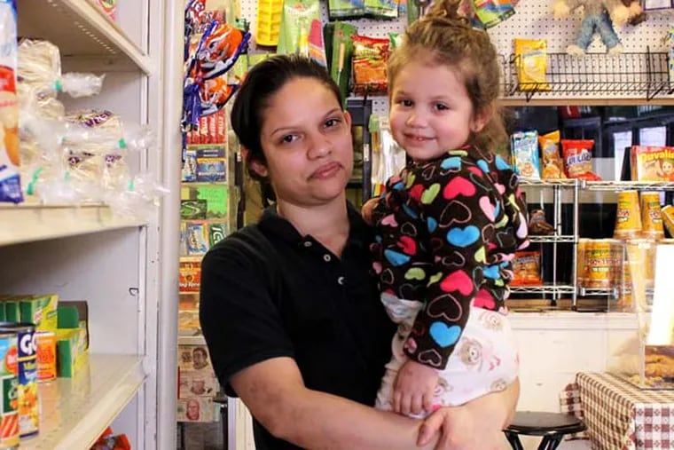 Pilar Molina and her daughter, Ariana, at her shop, Tortilleria La Familia, in Norristown, Pennsylvania, on Tuesday, March 11, 2014. ( COURTNEY MARABELLA / Staff Photographer )