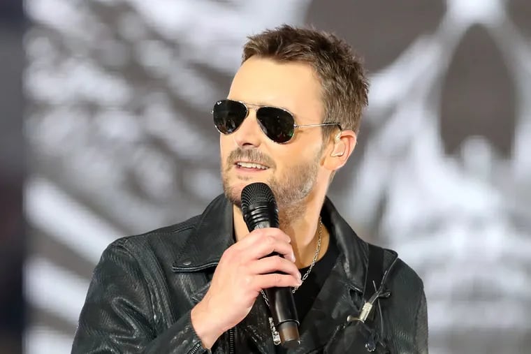 Country singer Eric Church performs at halftime of the Washington Redskins, Dallas Cowboys football game on Thursday, Nov. 24, 2016 at AT&T Stadium in Arlington, Texas.