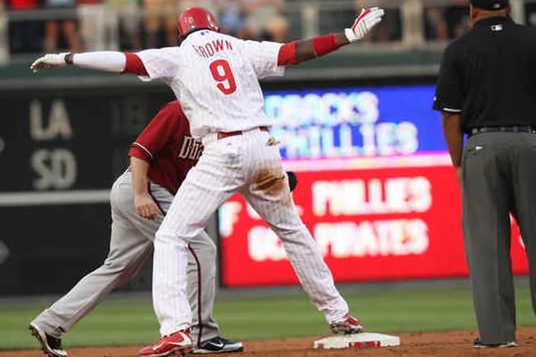 After his first at-bat, Domonic Brown is safe at second base with a double that scored Jayson Werth.