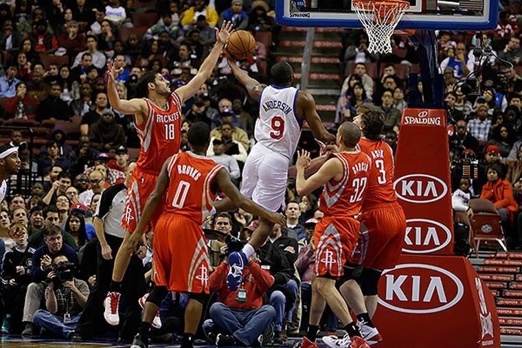 76ers guard James Anderson drives to the basket. (Matt Slocum/AP)