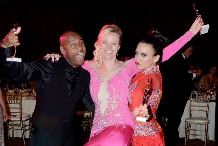 The National Constitution Center's Alison Young, center, the winner of Dancing with Philadelphia Stars.