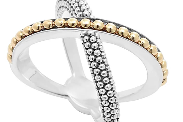 Infinity gold beaded X-ring, by Lagos. Wear one on the index finger to make a bold impression.