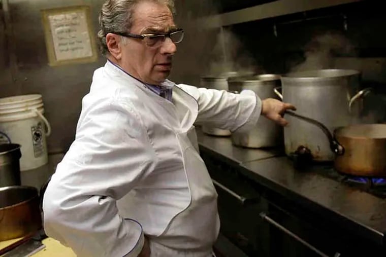 Chef Georges Perrier, owner of LeBec-Fin, cooks inside the landmark restaurant he created 40 years ago. The restaurant is located at 1523 Walnut Street in Philadelphia, Pa.  on March 30, 2011.  ( David Maialetti / staff photographer )