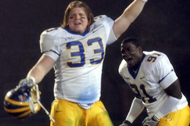 Jeremy Kametz and Siddiq Haynes (right) celebrate Delaware&#0039;s win over Southern Illinois in the Football Championship Subdivision semifinal.