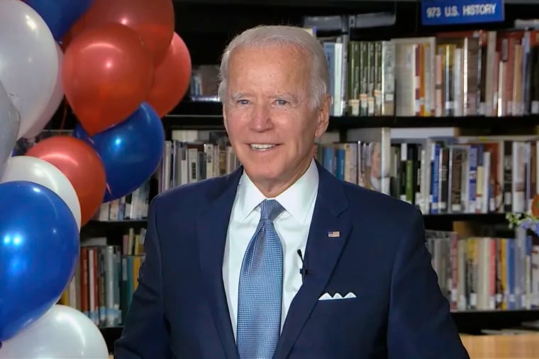 In this image from video, Democratic presidential candidate former Vice President Joe Biden smiles after the roll call vote during the second night of the Democratic National Convention on Tuesday.
