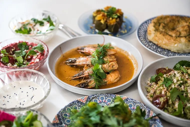 At Spice Finch, the menu starts with a mezze of beet borani, tahini, garlic yogurt, flatbread, crudites, and grape leaves, and continues with dishes like broccoli tabbouleh, garlic-harissa shrimp, and spinach and cheese kichi.