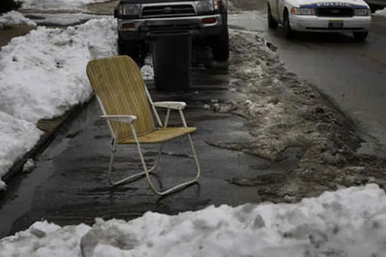 It's illegal to use an object, like a chair, to hold your dug-out space. (Michael S. Wirtz / Staff Photographer).