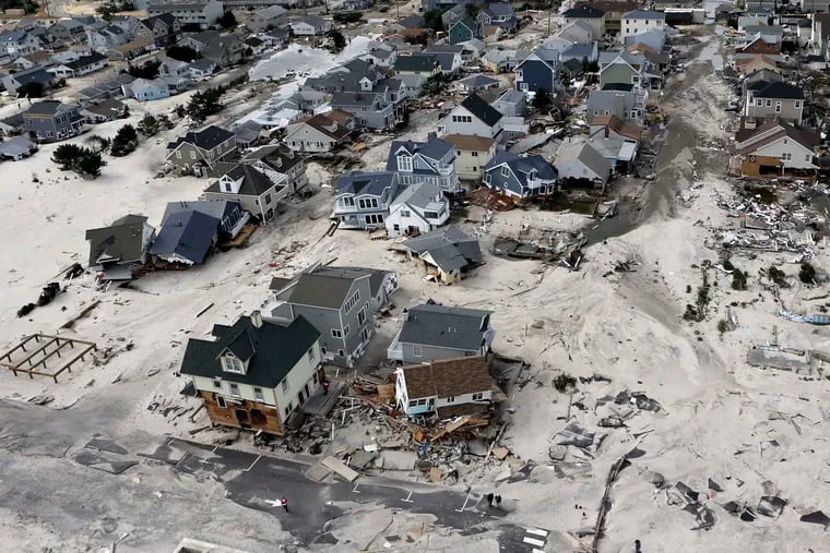 FILE - This Oct. 31, 2012 file photo shows destroyed homes left in the wake of Superstorm Sandy in Ortley Beach, N.J.