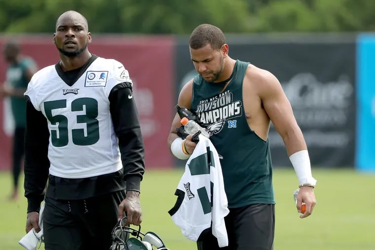 Eagles' Nigel Bradham, left, Kamu Grugier-Hill, right, walk off the field together at Philadelphia Eagles training camp at the NovaCare Complex on July 27, 2018 in Philadelphia, PA. DAVID MAIALETTI / Staff Photographer