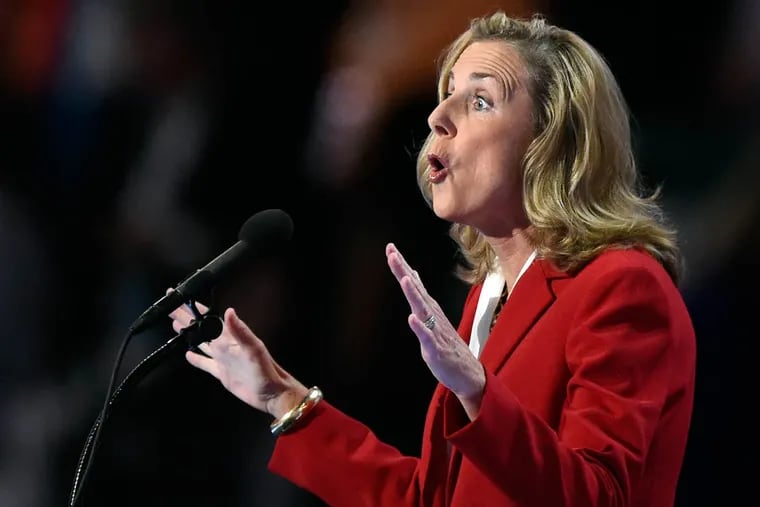 Katie McGinty addresses delegates at the Democratic National Convention in Philadelphia in July. The senatorial candidate's past success in bringing a  Spanish wind-turbine firm to Pennsylvania is being attacked by Sen. Pat Toomey (R., Pa.) and his allies as a "special deal."