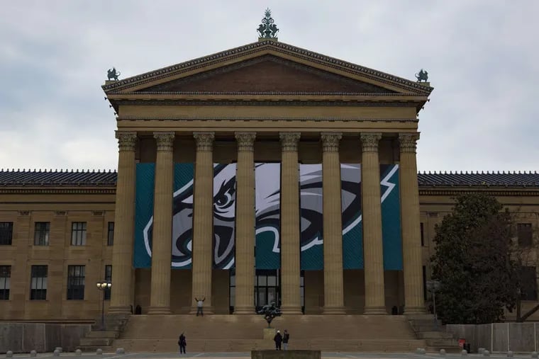 The Eagles&#039; logo hangs at the Philadelphia Museum of Art in preparation for Thursday&#039;s ceremony.