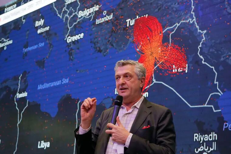 Filippo Grandi , who heads the U.N. refugee agency, talks at the World Economic Forum in Davos, Switzerland, about the flow of refugees. MICHEL EULER / AP