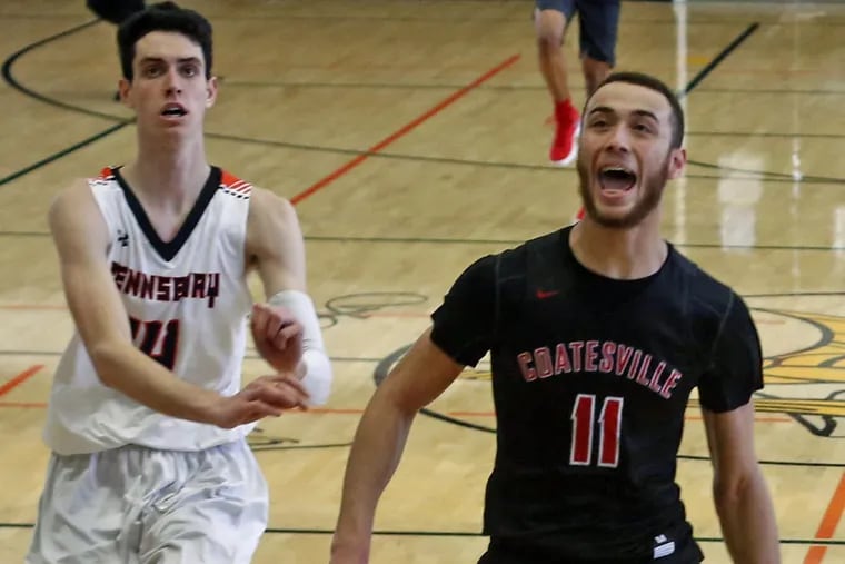 Coatesville’s Tyrel Bladen (11) celebrates a basket next to Pennsbury’s Chad Weldon (14) in the Red Raiders’ 52-42 victory last Saturday.