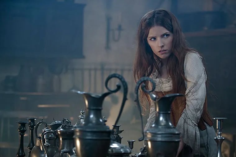 Anna Kendrick stars as Cinderella in "Into the Woods." In theaters Dec. 25, 2014, the film showcases familiar characters and stories with a surprising twist that calls into question the idea of "happily ever after." In theaters Dec. 25, 2014. ( Peter Mountain/Disney)