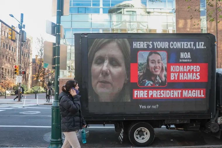 A privately funded truck flashing a message on Penn president Liz Magill’s testimony to Congress is parked at 36th and Walnut outside of Penn’s campus in Philadelphia on Friday, Dec. 8, 2023.