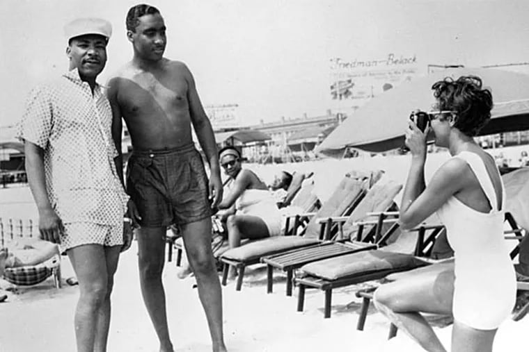 An exhibition of John W. Mosley's photographs will include this shot of a young Martin Luther King Jr. (left) on &quot;Chicken Bone Beach&quot; in Atlantic City. (John Mosley/Courtesy Charles L. Blockson Afro American Collection)