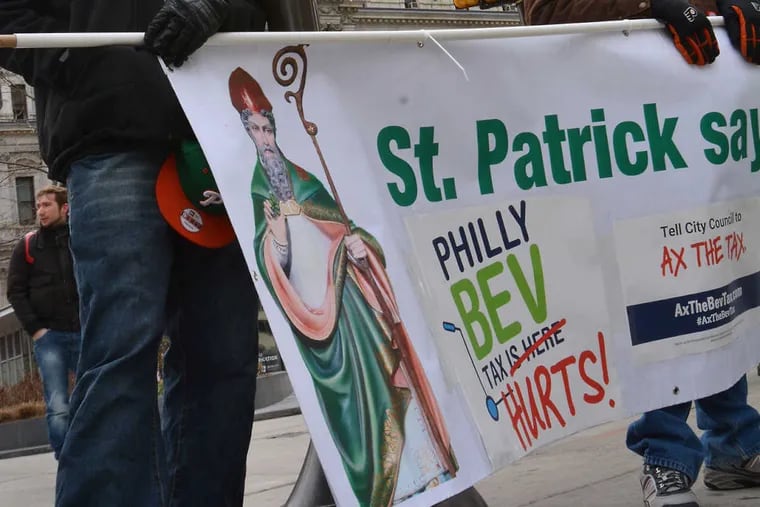 Union Local 830 members protest the beverage tax during St. Patrick&#039;s Day Parade last Sunday.