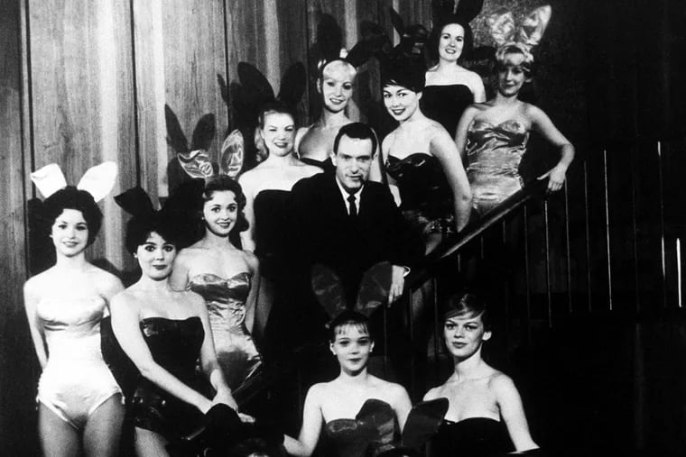 Hugh Hefner, founder and chairman of the Playboy Enterprises, Inc., is pictured amid a group of Bunnies, at the flagship Playboy Club, in Chicago, Ill., circa 1960.