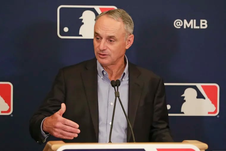 MLB commissioner Rob Manfred's office announced a plan to compensate minor leaguers for their spring-training allowances through April 8.