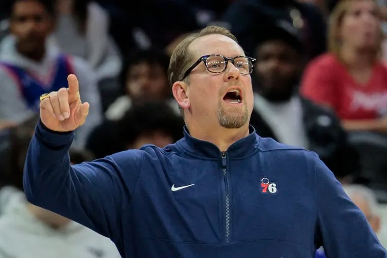 Sixers head coach Nick Nurse calls plays against the Celtics during the 1st quarter at the Wells Fargo Center in Philadelphia, Wednesday, October  11, 2023.