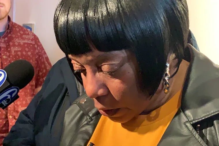 Vernesta Green speaks with reporters after a news conference at which Atlantic County Prosecutor Damon Tyner announced two arrests in the 23-year-old murder of her son, Antojuan Huffin. Green said she "left it in God's hands" after giving up hope that authorities would ever charge anyone in the murder.