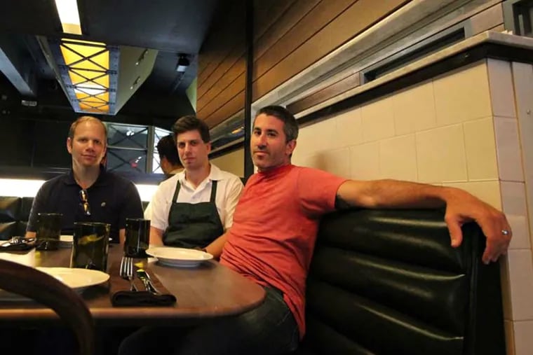 At Abe Fisher (from left) Steve Cook, chef Yehuda Sichel, and Michael Solomonov.  MICHAEL KLEIN / Philly.com