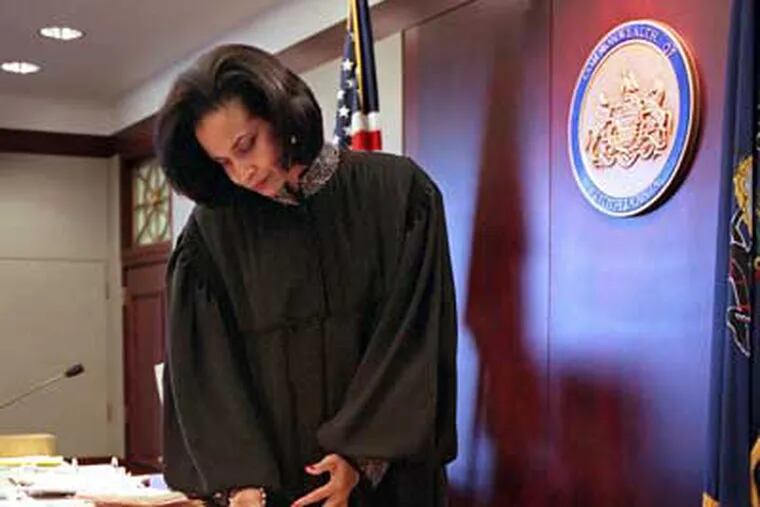 Common Pleas Judge Renee Cardwell Hughes, shown in a November 2000 photo, is trying the high-profile case of two men accused of killing Police Sgt. Stephen Liczbinski. (Tom Gralish / Staff Photographer)